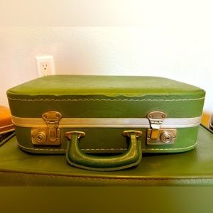 Vintage antique small luggage suitcase. Avocado green 60s style. Groovy pattern.